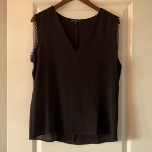 Black sleeveless blouse with arm trim detail, M